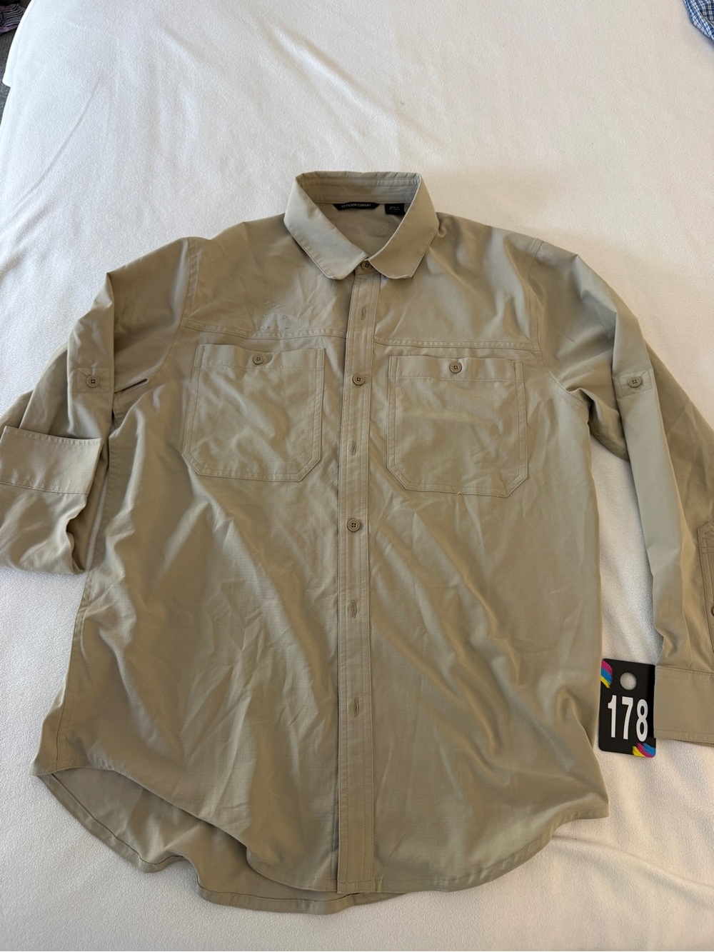 Filson Men's Casual Long-Sleeve Button-Down in Khaki (worn area above pocket)